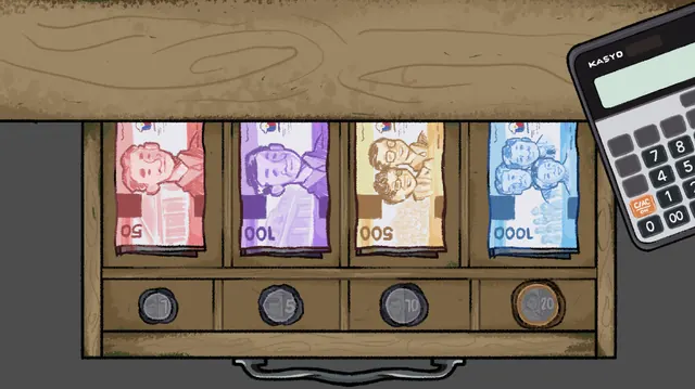 Ang cash drawer na may mga baryang piso at perang papel